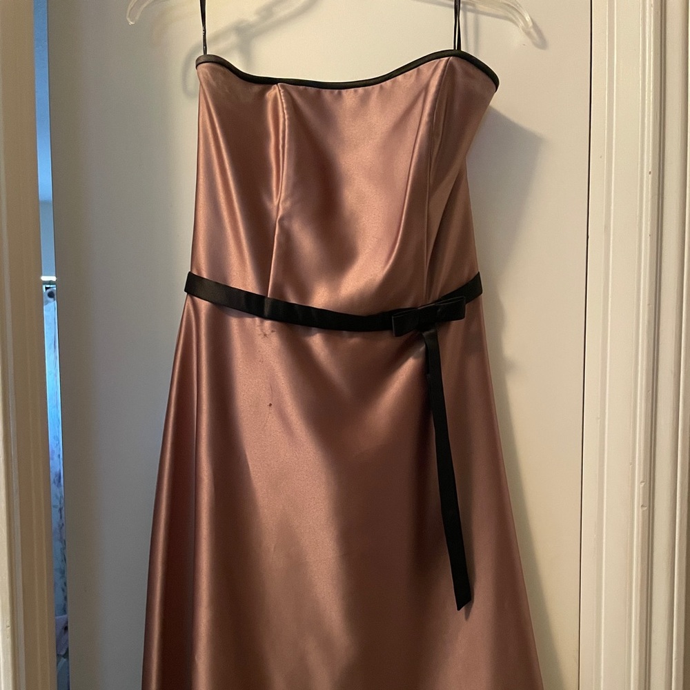 Rich taupe colored formal strapless dress.